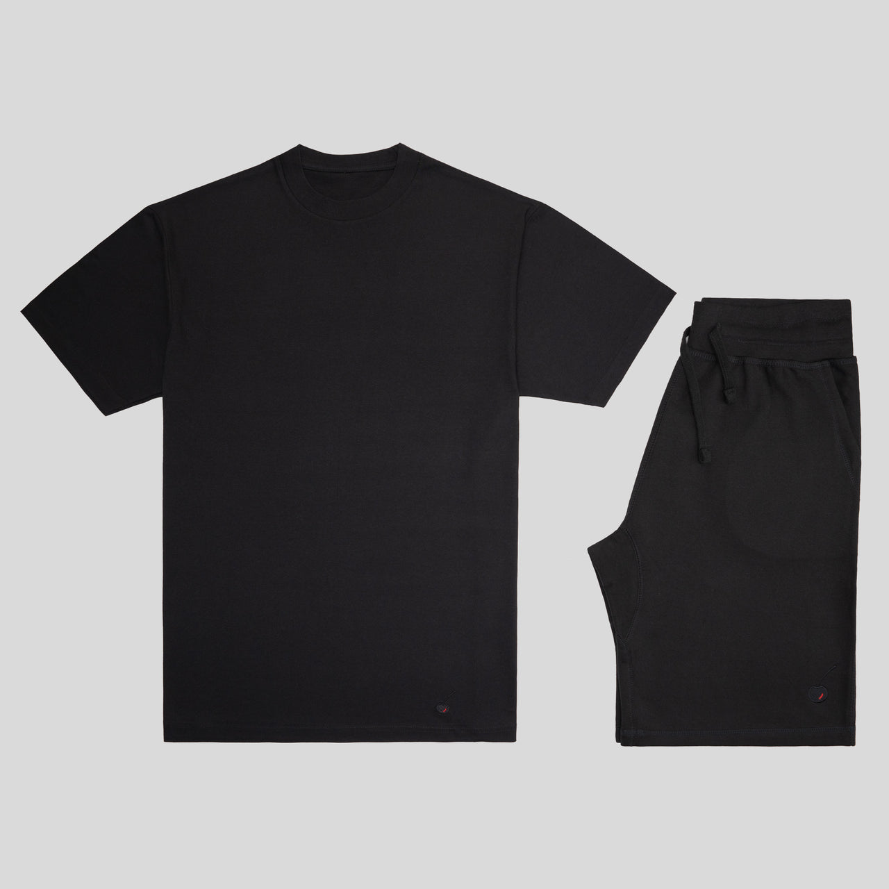 All-black short set with tonal cherry logo – premium tee and shorts for everyday wear or training